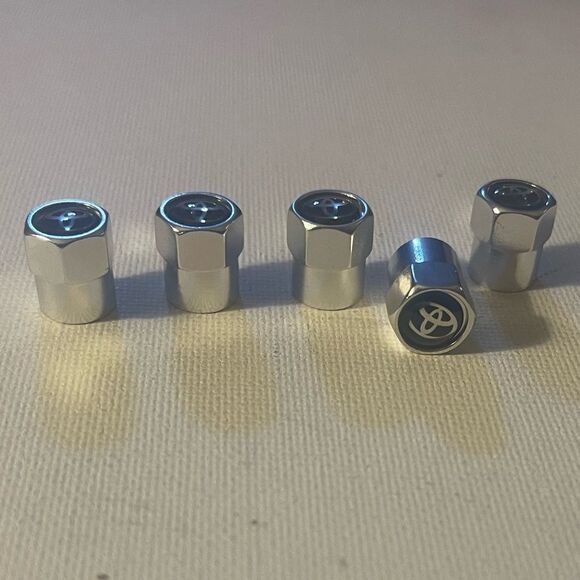 Toyota Logo Valve Stem caps in Silver set of 5 NWT - Picture 1 of 5